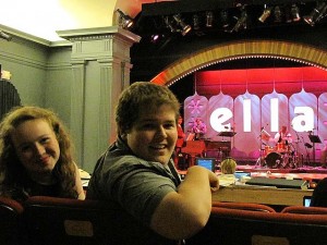 2012 Ambassadors Angelica Carroll and Matthew Eckler observe a tech rehearsal for Ella./Photo provided.