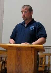 Fire chief Matt Wilson urges the Select Board to help his volunteer department with uniform and training funds.