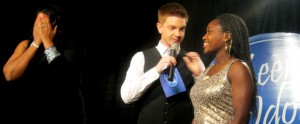From left, Michelle Brooks-Thompson realizes she has won 1st Place as emcee Jared Goodell tells Prescott she has come in 2nd Place.