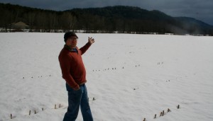 Barre Pinkse in the field on Route 103 across from the Heritage Deli that he believes could make a fairgrounds. Photo by Shawn Cunningham