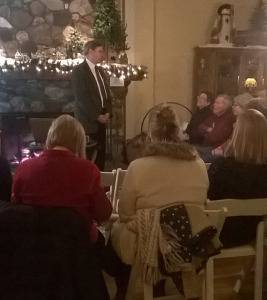 Architect Steven Cecil, standing, speaks to a crowded house at the Fullerton Inn last week. Brian Morris photo.