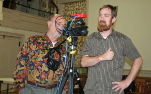 SAPA Executive Director Jared Gunnell, right, and cameraman Ed Huse check the setup for their live streaming test.
