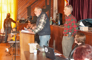Select board member Paul Gordon introduces the article to contract with Vermont State Police for added patrols of the town