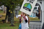 Locals rally to support environmental lawsuit