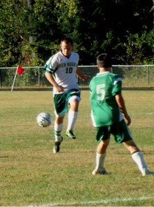GMs Jake Cavacas takes on a Rebel defender. Photo by Greg Hart