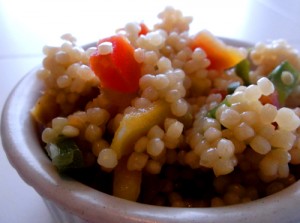 Dried fruit cooked in couscous makes a light, sweet side pasta.
