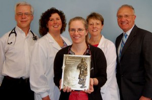 From left, accepting the 2013 VHA Clinical Excellence Award on behalf of Springfield Hospital: Ted Cody, MD; Kelley Tully, inpatient clinical manager; Katrina Harris, DO, president of medical staff; Sue Pollard, RN, case manager; and Richard Marasa, MD, director of emergency services./Photo provided
