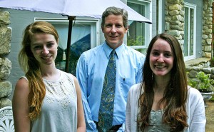 Springfield Rotary Club scholarship committee chair Bob Flint of Springfield Redevelopment Corp. congratulates recent graduates Springfield High School graduates Shelby Reardon and Courtney Page, who were recently honored as recipients of $2,500 scholarships from the Rotary Club. Reardon will attend Boston University while Page will be studying at Gordon College. Proceeds from the annual Rotary Penny Sale help to fund the annual scholarship program./Photo submitted.