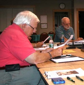 Whiting Library board of trustees chair Bruce Parks reads a letter to the Select Board. Select Board member Arne Jonynas is in background./ Photos by Cynthia Prairie