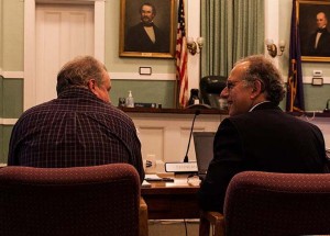 Shawn Cunningham, left, and Smart Growth attorney James Dumont talk during a break in the proceedings.