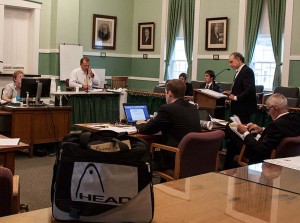 Clockwise from left, court clerk Jackie Fletcher, David Saladino on the stand, two law clerks, attorney James Dumont cross -examining Saladino, and Zaremba attorneys Alan Biederman and David Cooper.