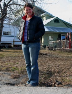 Suzanne Munukka stands in the sunken drain at the the corner of Cross and Mountain View roads, next to her home early last spring. Suzanne Munukka stands in the sunken drain at the the corner of Cross and Mountain View roads, next to her home early last spring. Photo by Cynthia Prairie