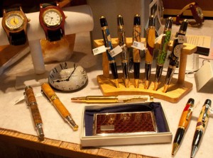 Marble pens and watches with wooden wristbands, handmade by  a New Hampshire craftsman.
