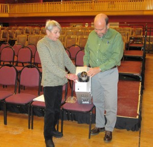 Ludlow Donates Projector to Black River Museum Pictured left to right, Anita Alic, representing Black River Academy Museum (BRAM) and Frank Heald, Ludlow's Town Manager, as the town of Ludlow formally presents BRAM with a Sharp movie projector. Friends of Ludlow Auditorium originally presented the projector to the town in 2010 for use showing movies. A new projector was recently donated the Ludlow Auditorium and Heald thought that BRAM, given its frequent historical presentations and programs, would benefit from a donation of the older projector.