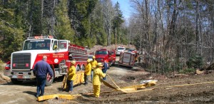 Firefighters from eight companies aided the Chester Fire Department to put out a 2-acre brush fire Sunday afternoon. Photos by Shawn Cunningham. Click photo to launch the gallery.