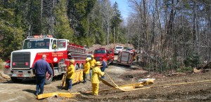 Firefighters from eight companies aided the Chester Fire Department to put out a 2-acre brush fire Sunday afternoon. Photos by Shawn Cunningham. Click photo to launch the gallery.