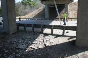 In the foreground lays more concrete that fell off the underbelly of the I-91 overpass. 