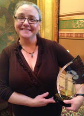 Kelly Stettner recognized for environmental work. 