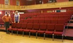 Ludlow Auditorium selling off 90-year-old seating; celebrates new cushioned chairs