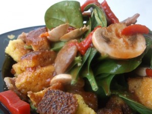 Corn bread salad with a tangy sausage dressing
