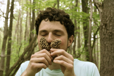 Ari Rockland-Miller with morels. Photo by The Mushroom Forager