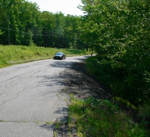 The northern edge of this stretch of Popple Dungeon Road is giving way. The West Branch of the Williams River is a contributing factor. Photos by Cynthia Prairie Click to enlarge.