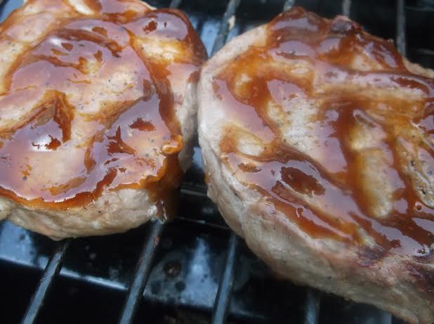 Grilled pork shines under an apple jelly sauce.
