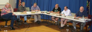 Discussing issues on Wednesday, July 2 were, from left, town manager David Pisha, Select Board chair John DeBenedetti, and board members Tom Bock, Derek Suursoo, Bill Lindsey and Arne Jonynas. Click photo to enlarge.