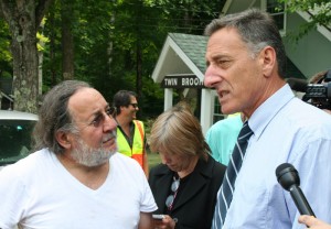 Rich Defoe, whose son owns Riverhaus, speaks with Gov. Peter Shumlin, right.