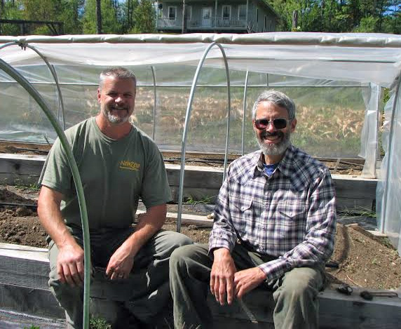 Lee Gustafson of Net Zero Renewable Resources, left,  has purchased Good Wood, a maker of raised bed and greenhouse kits from its owner, Irwin Post, right.