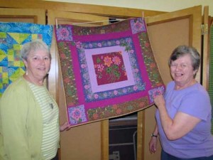 Quilters show off quilt to be displayed at QuiltFest