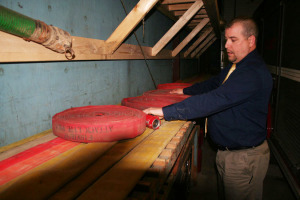 Chester Fire Chief Matt Wilson shows the fire hoses that are waiting to be dried from a fire 10 days earlier. Photos by The Chester Telegraph. Click to launch the gallery.