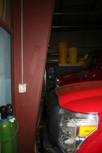 The cab on Engine 1, in the back, had to be shortened to fit in the garage at a cost of $50,000.