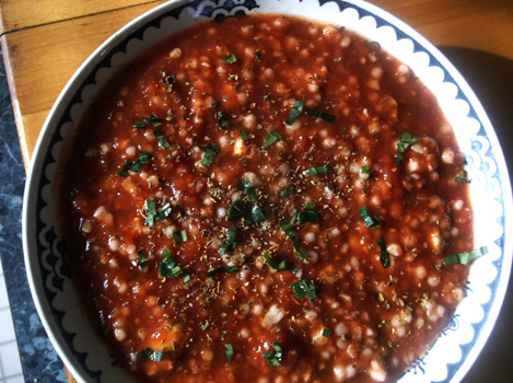 New England style couscous highlighted with clams