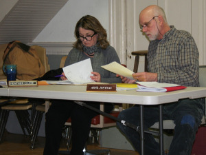 Prior to her first meeting on the Chester Select Board, Heather Chase, reviews documents with board member Arne Jonynas. Photos by Shawn Cunningham.
