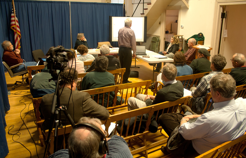 Chester town manager David Pisha, standing, presents a PowerPoint presentation to about 20 members of the public on a proposed water-gravel project. All photos The Chester Telegraph.