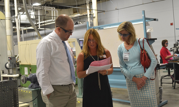 Monica Greene, center, offers a tour of Vermont Precision Tools to Seth Goodall, Small Business Administration New England administrator, left, and Darcy Carter, SBA Vermont District director, in August. Photo by Danny Monahan/SBA.    