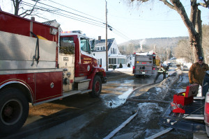 Fire trucks line up along Grafton Street to fill their tanks at a hydrant. Telegraph photos.