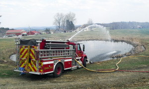 Chester's Engine One draws water from a pond while relieving excess pressure back into the pond. All photos Shawn Cunningham. Click any photo to launch gallery. Chester's Engine One draws water from a pond while relieving excess pressure back into the pond.
