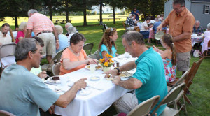 Food and drink, fresh air, family and friends come together at St. Luke's August Supper