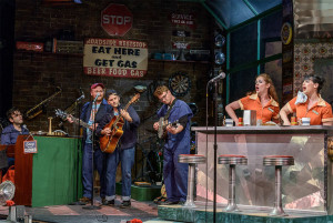 From left, Joe Iconis, Jason SweetTooth Williams, Eddie Lorenzo Wolff, Seth Eliser, Grace McLean and Molly Hager light up the stage and the audience in Pump Boys and Dinettes. Photo by the Weston Playhouse.