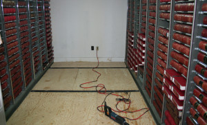 The vault floor leveled, with tracks about to be secured to the floor.