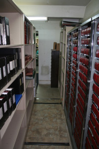 A view from the back of the vault looking out with new storage shelving to the left.