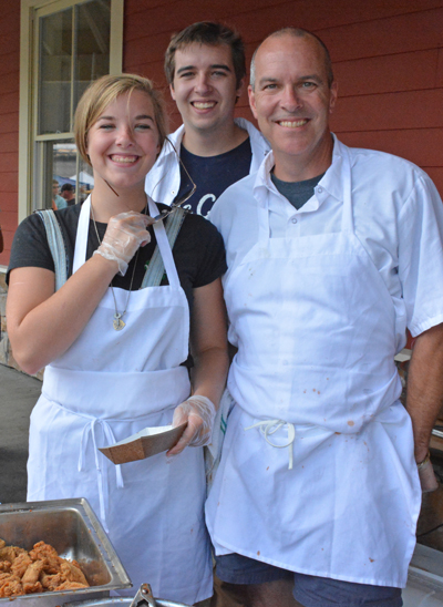 Okemo Hops in the Hills 2015 Chicken Wing Champions are Killarney owner Mark Verespy, right, who served up Sweet and Savory Barbecue Wings with the help of his children Molly, left, and Connor.