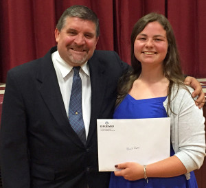  CAPTION: Okemo Mountain Resort Vice President and General Manager Bruce Schmidt presents Kateri Collins with the John F. Mueller Scholarship. (photo by Angi Benson)