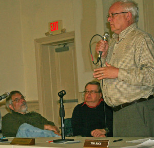 Town Manager David Pisha, far right, addresses financing issues while Select Board members John DeBenedetti, left, and Tom Bock listen.