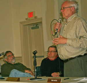 Town Manager David Pisha, far right, addresses financing issues while Select Board members John DeBenedetti, left, and Tom Bock listen.
