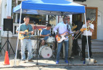 Saturday's musical opening was Ernie Belmond, center, and his band.