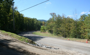 New alignment of Popple Dungeon Road awaits paving. The old alignment is down and to the right.