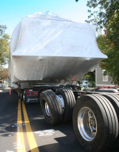 The truck's tire was damaged when the driver attempted to make a wider turn and his the curb at the Buckley Center on Main Street.